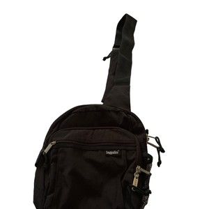 baggallini backpack 11” x 13” net bottle holder on the side pocket on strap